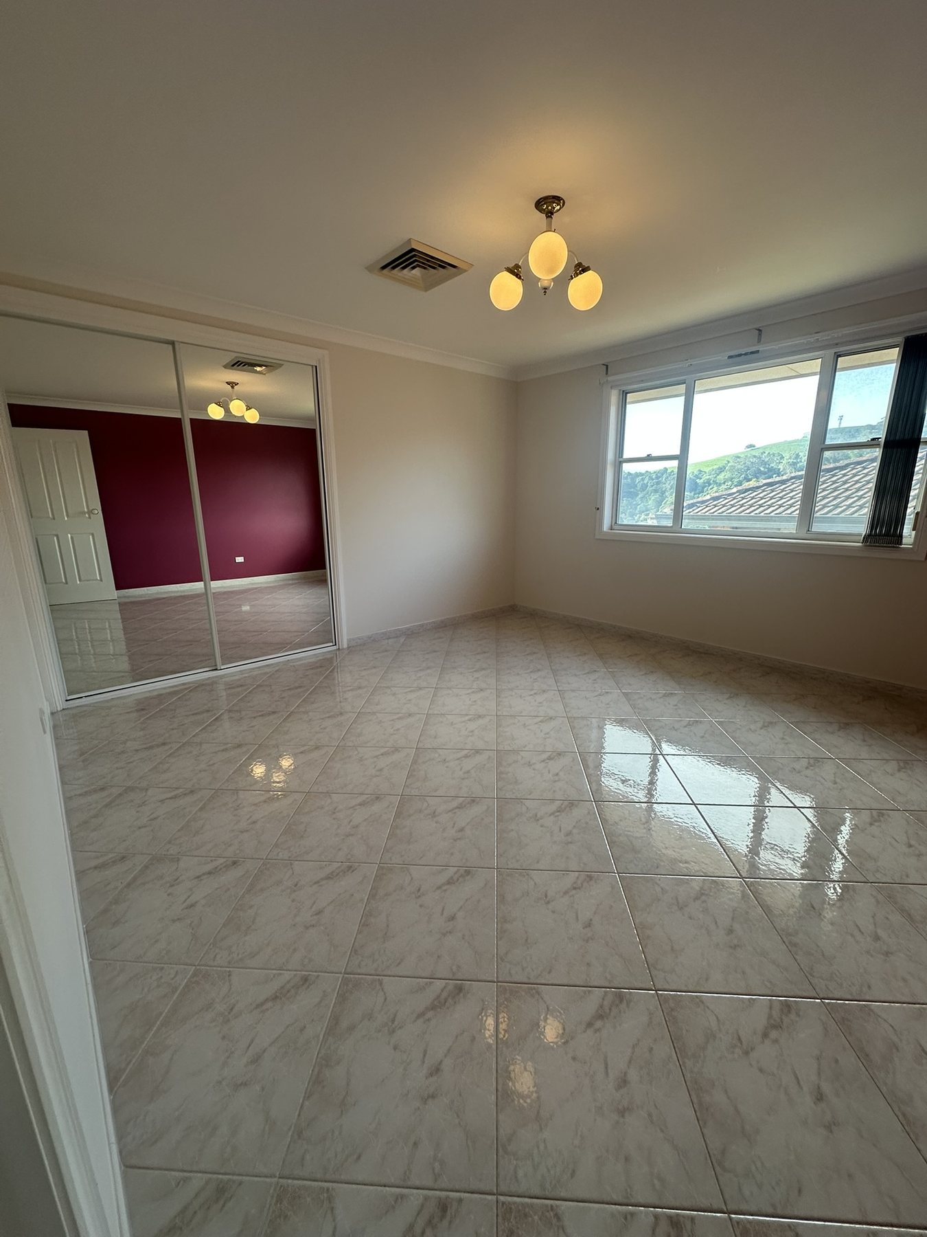 End of lease, clean empty room with tiled floors
