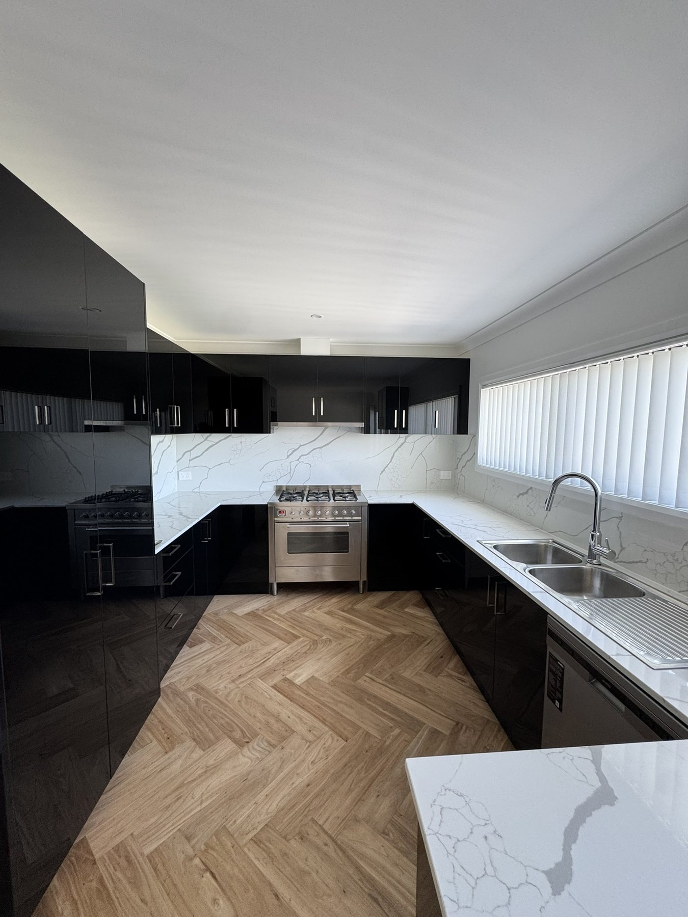 Deep cleaning, modern dark kitchen after deep clean